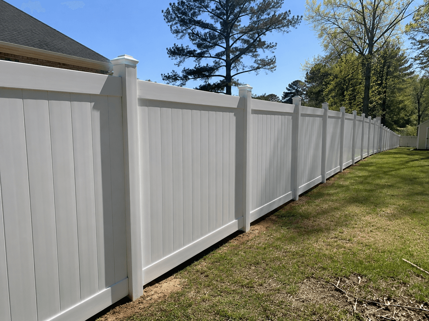 Completed Cornerstone pressure-treated pine privacy fence